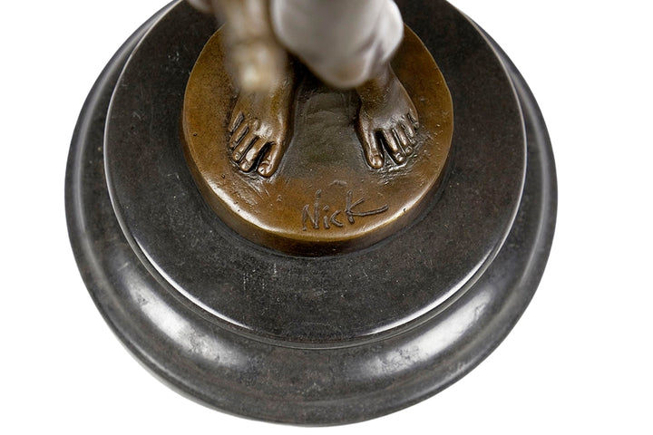 Bronze sculpture of a sensual posing male nude
