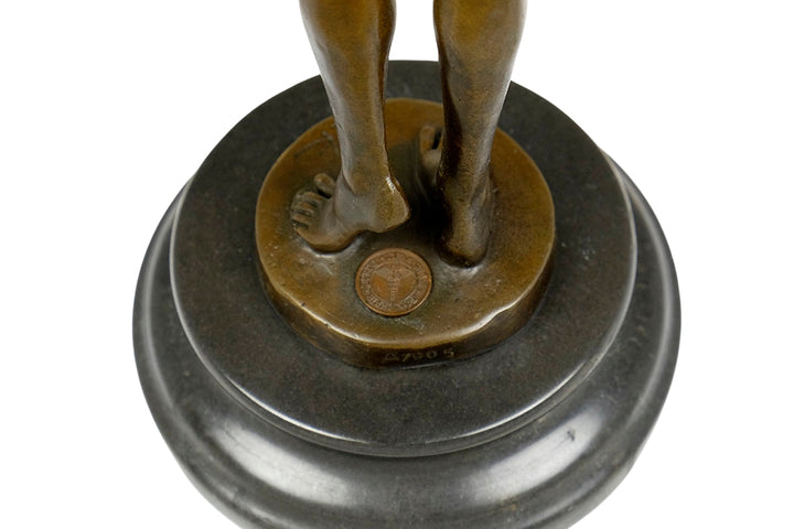Bronze sculpture of a sensual posing male nude