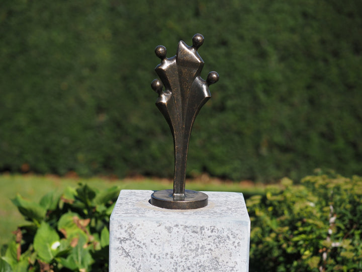 Abstract bronze sculpture of a family of four (medium)