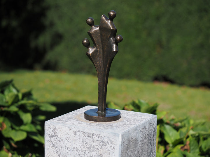 Abstract bronze sculpture of a family of four (medium)