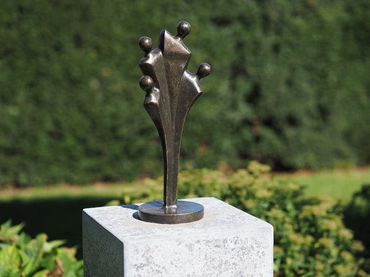 Abstract bronze sculpture of a family of four (medium)