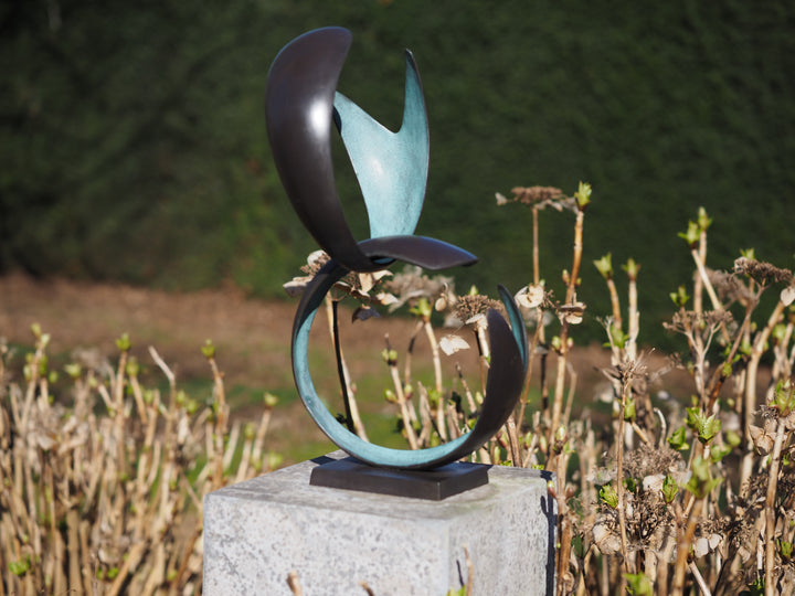 Modern bronze sculpture symbolizing harmony