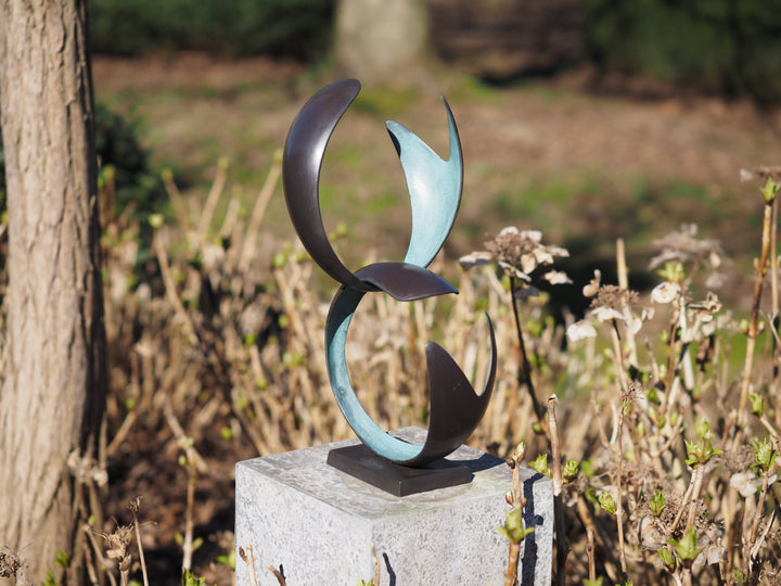 Modern bronze sculpture symbolizing harmony