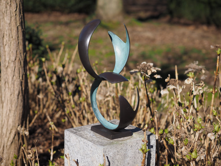 Modern bronze sculpture symbolizing harmony