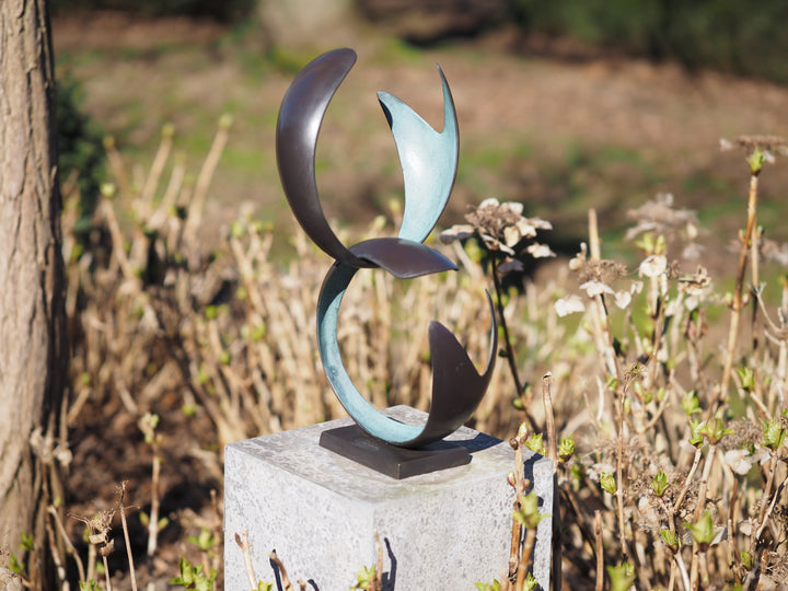 Modern bronze sculpture symbolizing harmony