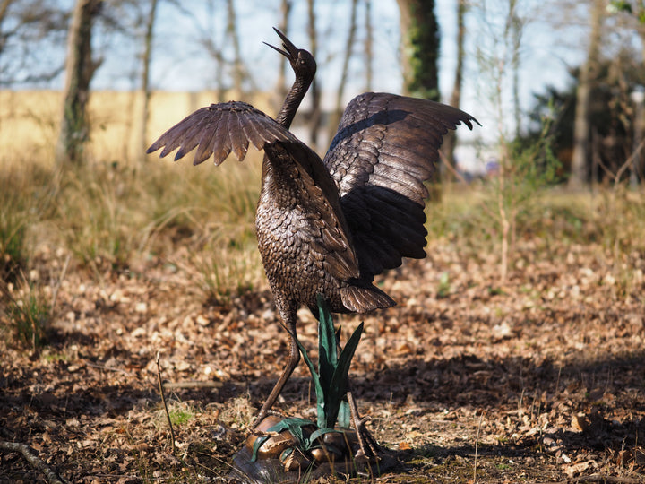 Graceful bronze stork fountain and sculpture