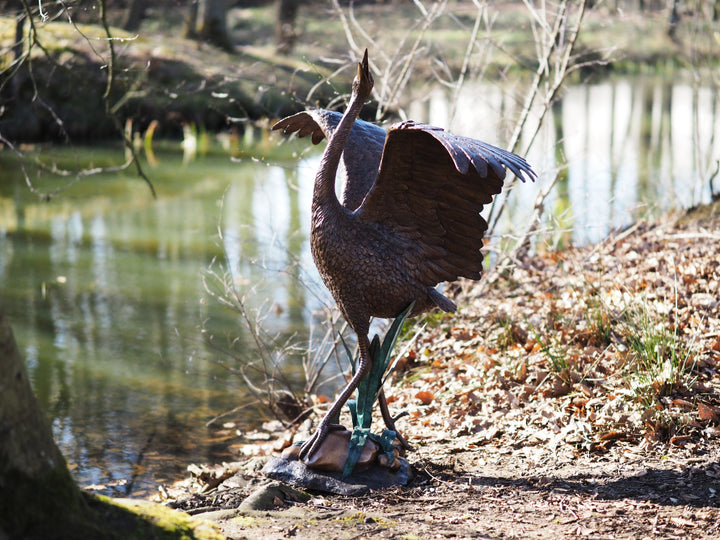 Graceful bronze stork fountain and sculpture
