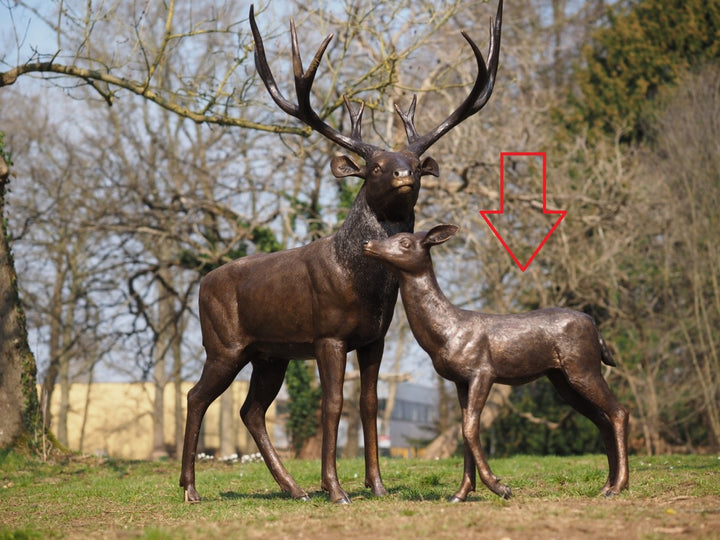 Large bronze sculpture of a deer calf