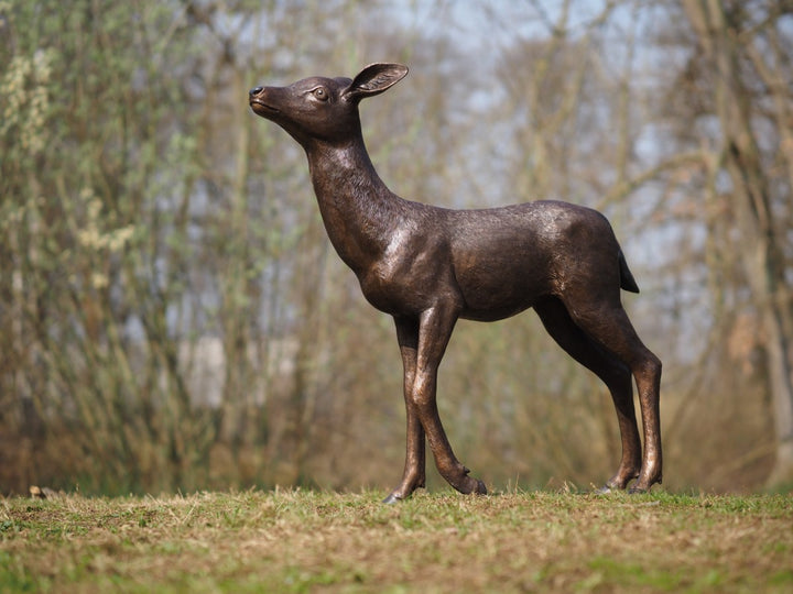 Large bronze sculpture of a deer calf