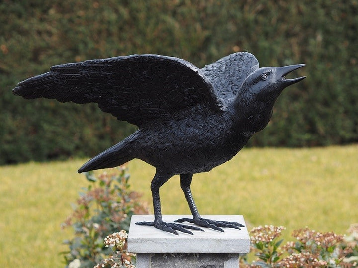 Lifesize bronze sculpture of a cawing raven