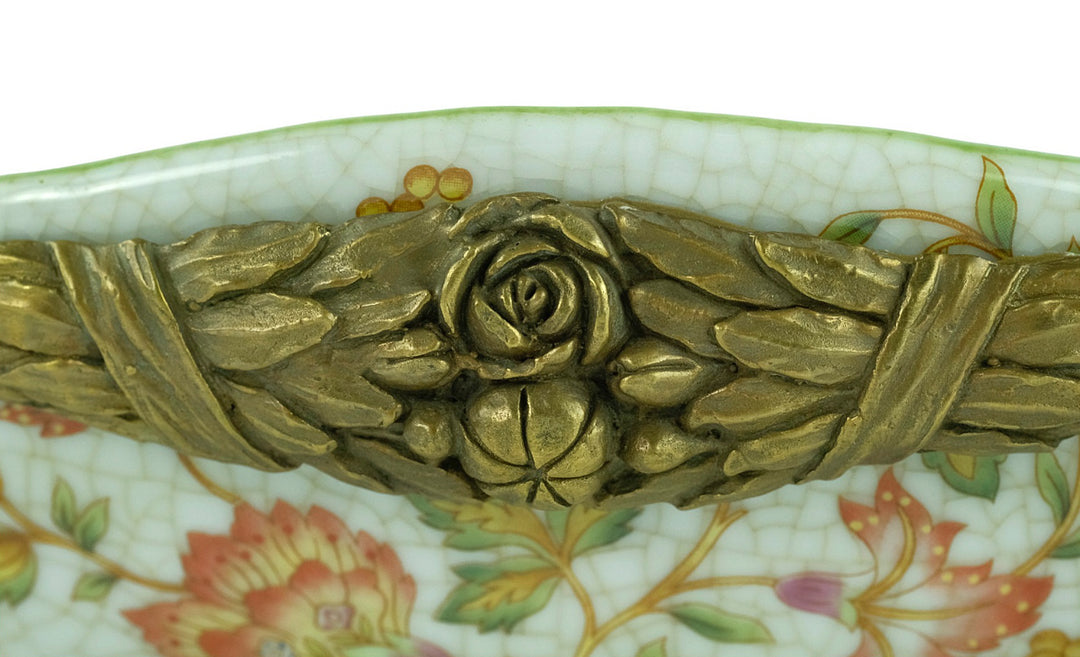 Porcelain tray with floral motifs carried by two bronze females