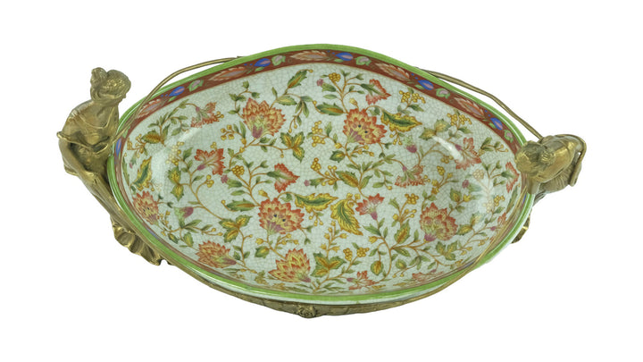 Porcelain tray with floral motifs carried by two bronze females