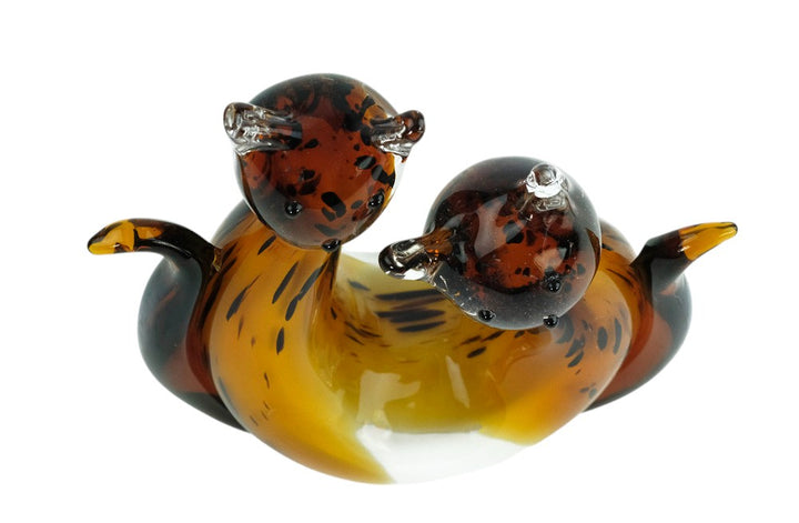 Glass sculpture of a cat pair