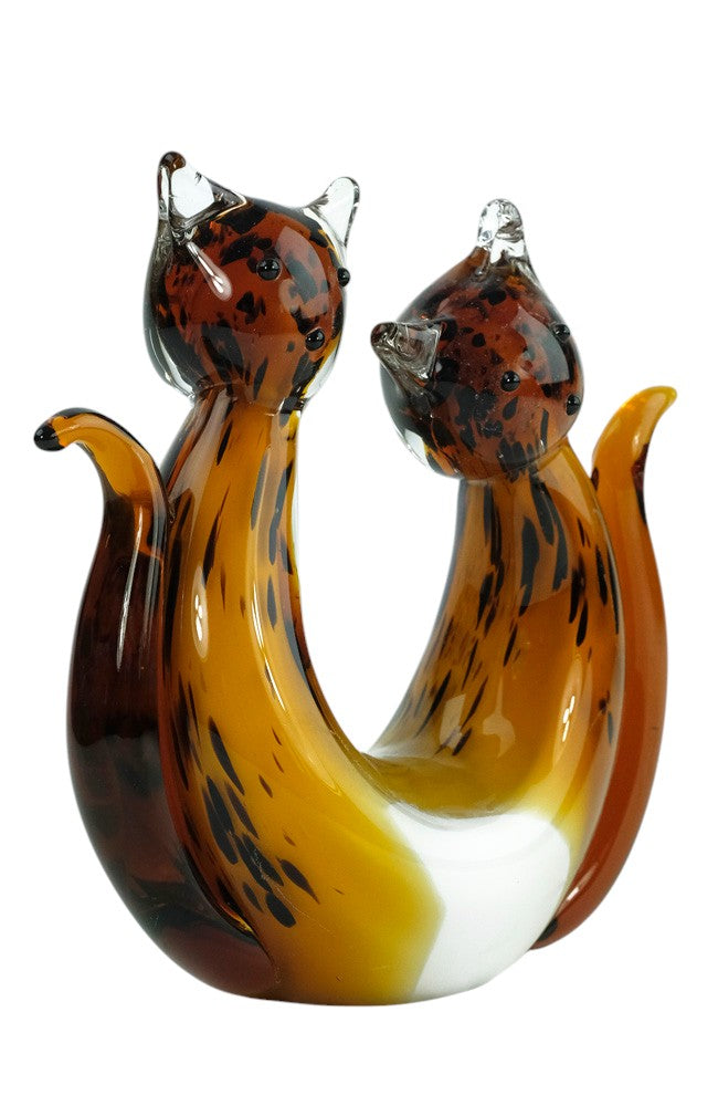 Glass sculpture of a cat pair