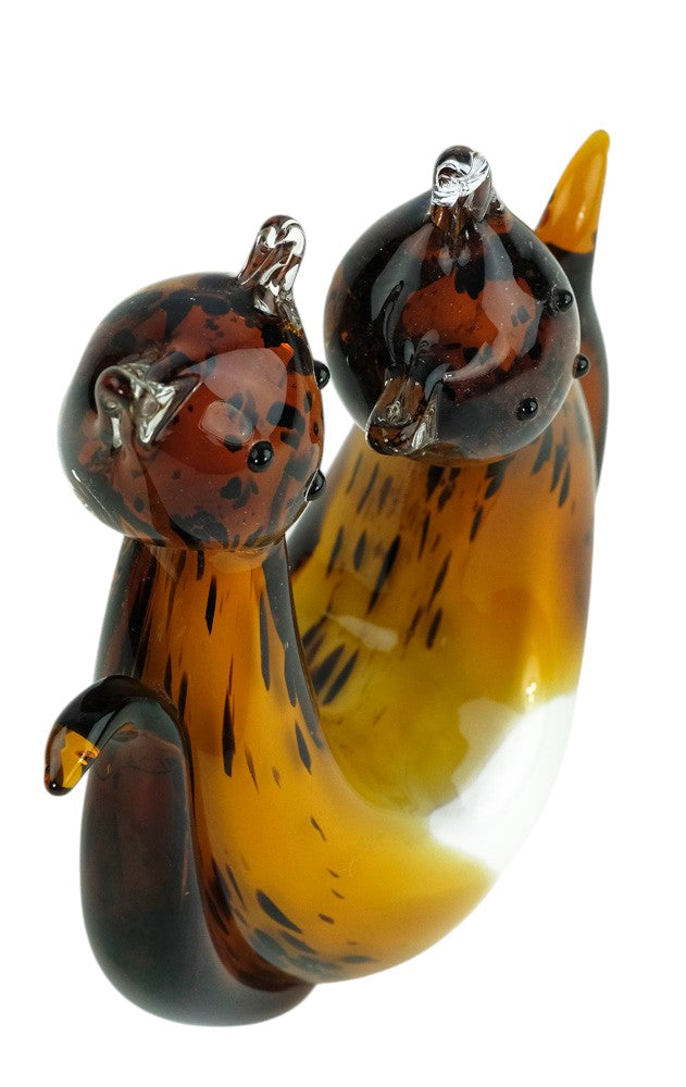 Glass sculpture of a cat pair
