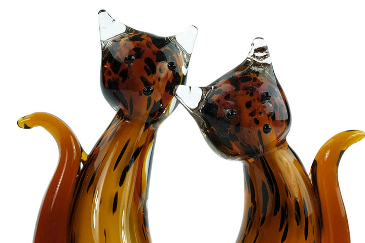 Glass sculpture of a cat pair