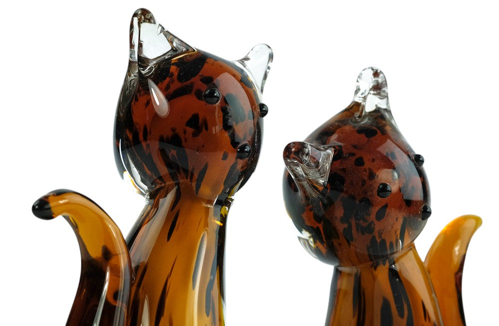 Glass sculpture of a cat pair