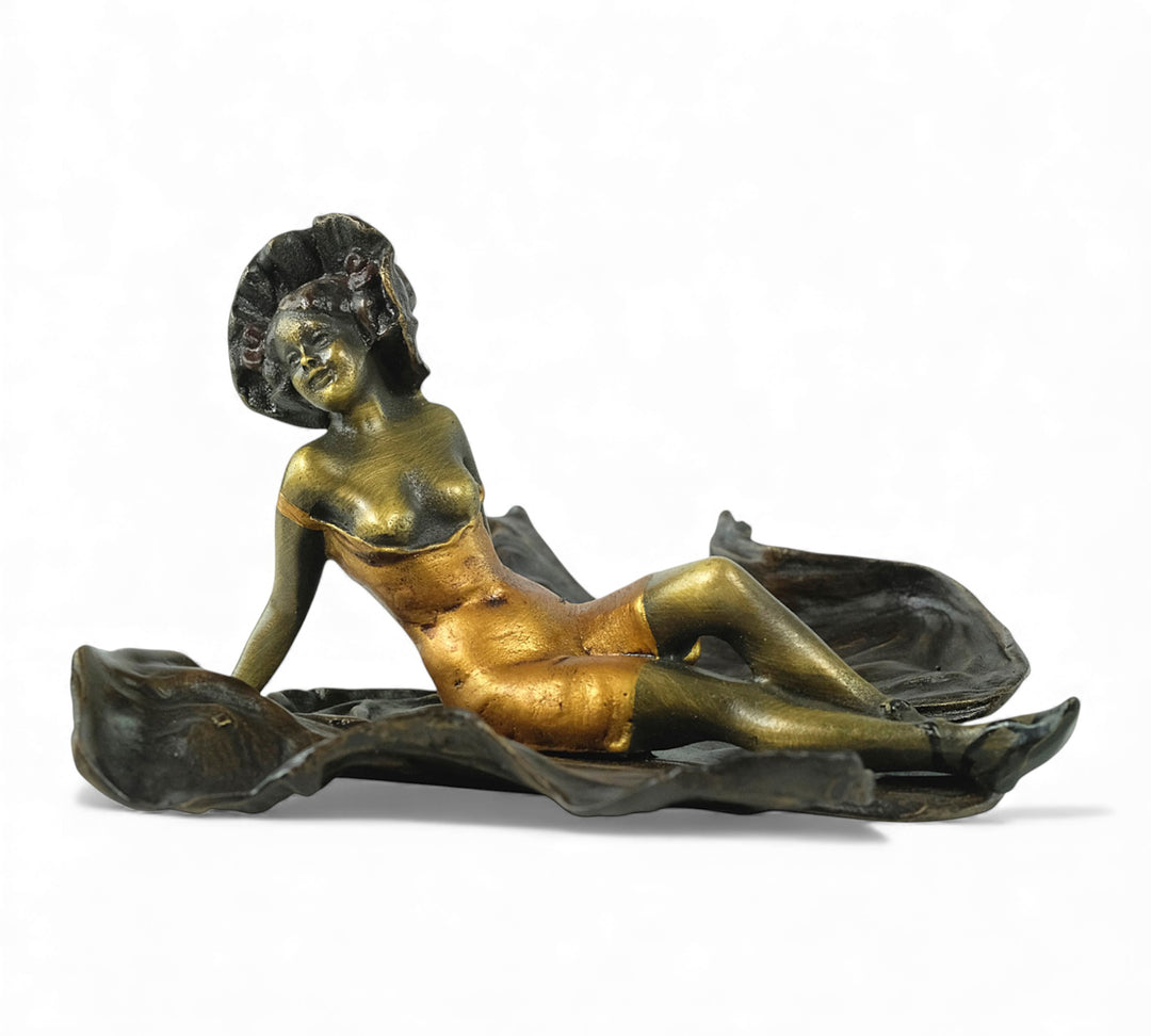 Vienna bronze sculpture of a sunbathing female