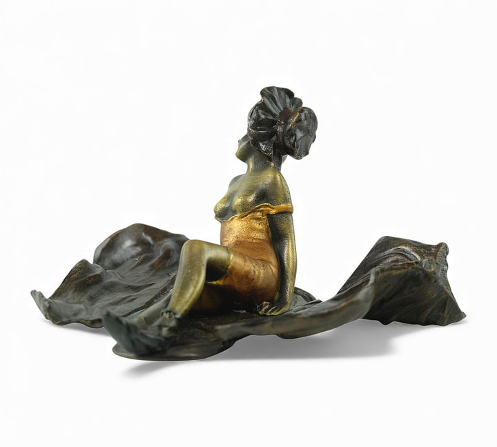 Vienna bronze sculpture of a sunbathing female