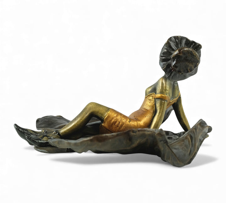 Vienna bronze sculpture of a sunbathing female