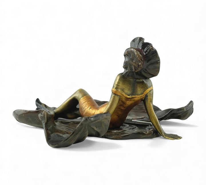 Vienna bronze sculpture of a sunbathing female