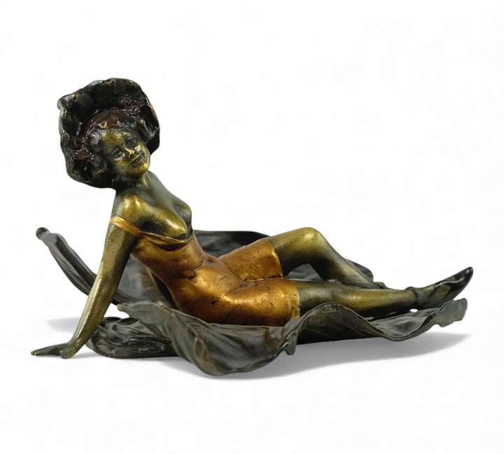 Vienna bronze sculpture of a sunbathing female