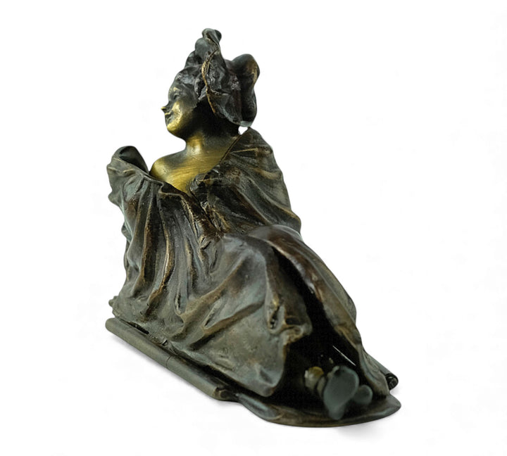 Vienna bronze sculpture of a sunbathing female