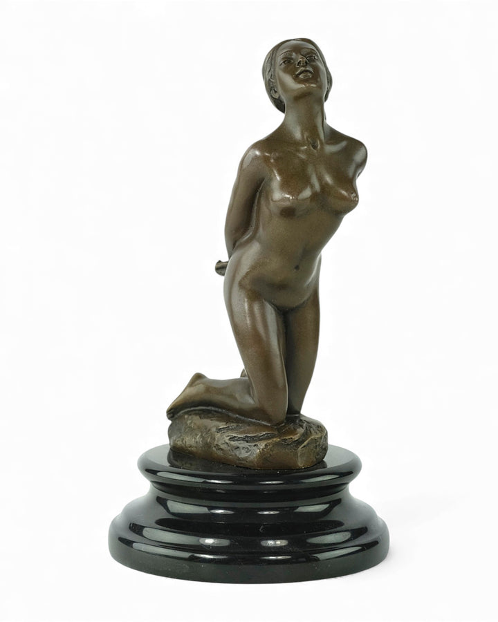 Bronze sculpture of a submissive kneeling female nude