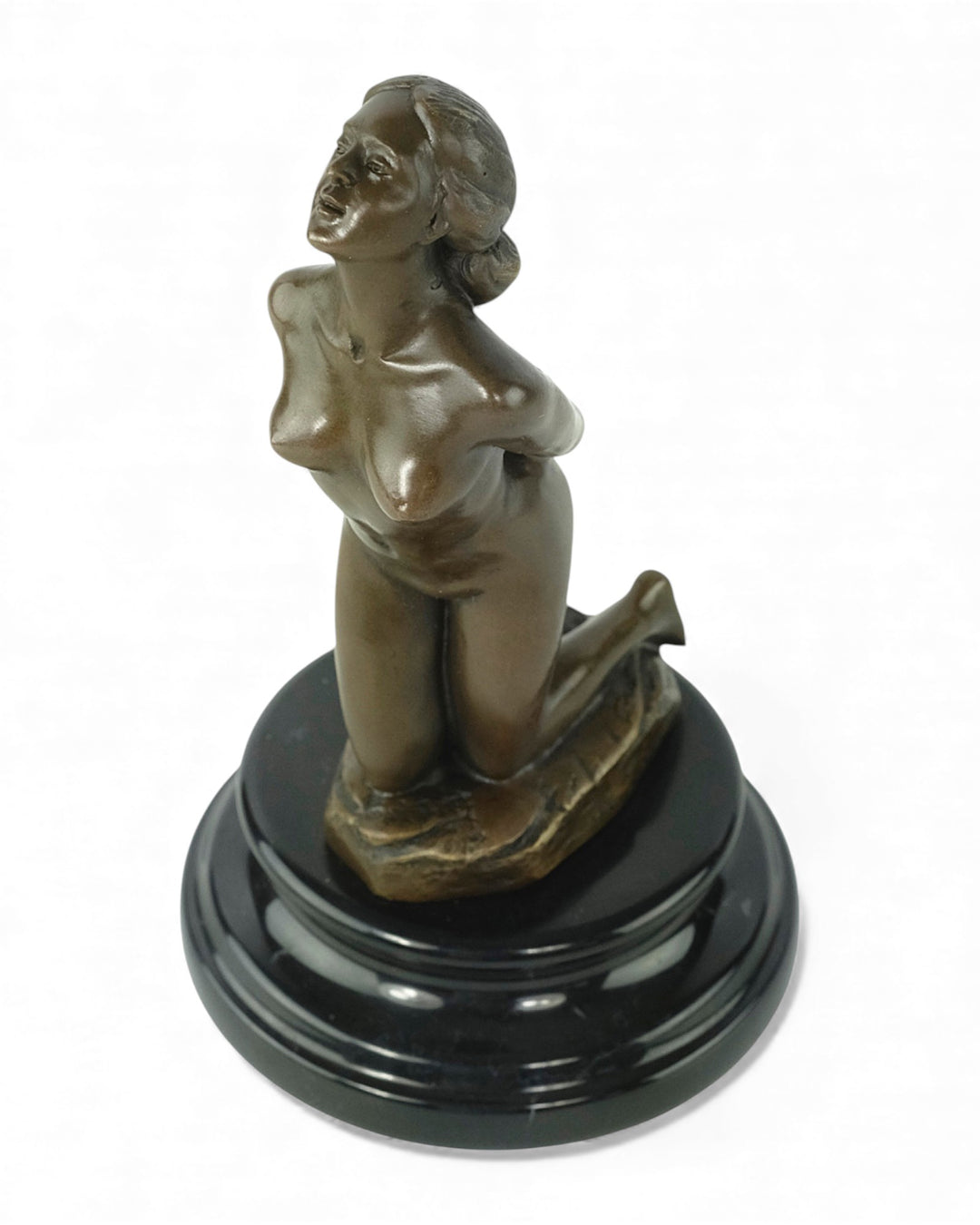 Bronze sculpture of a submissive kneeling female nude