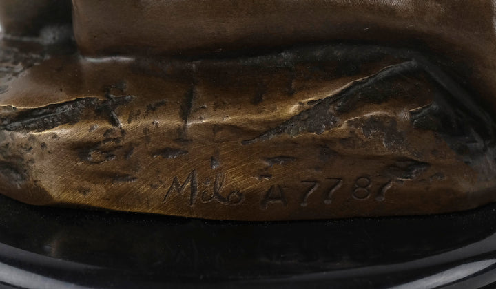 Bronze sculpture of a submissive kneeling female nude