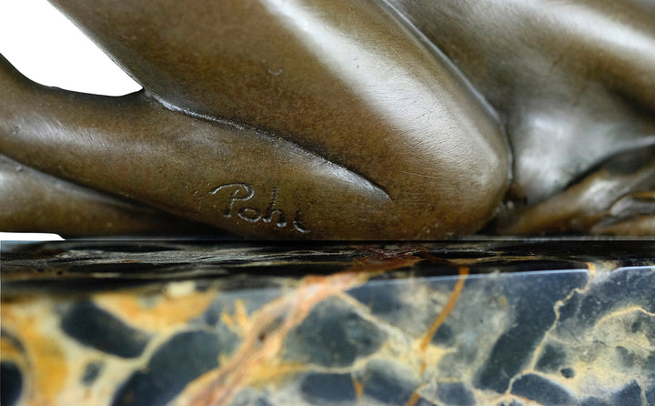 Bronze sculpture of a sensual resting female