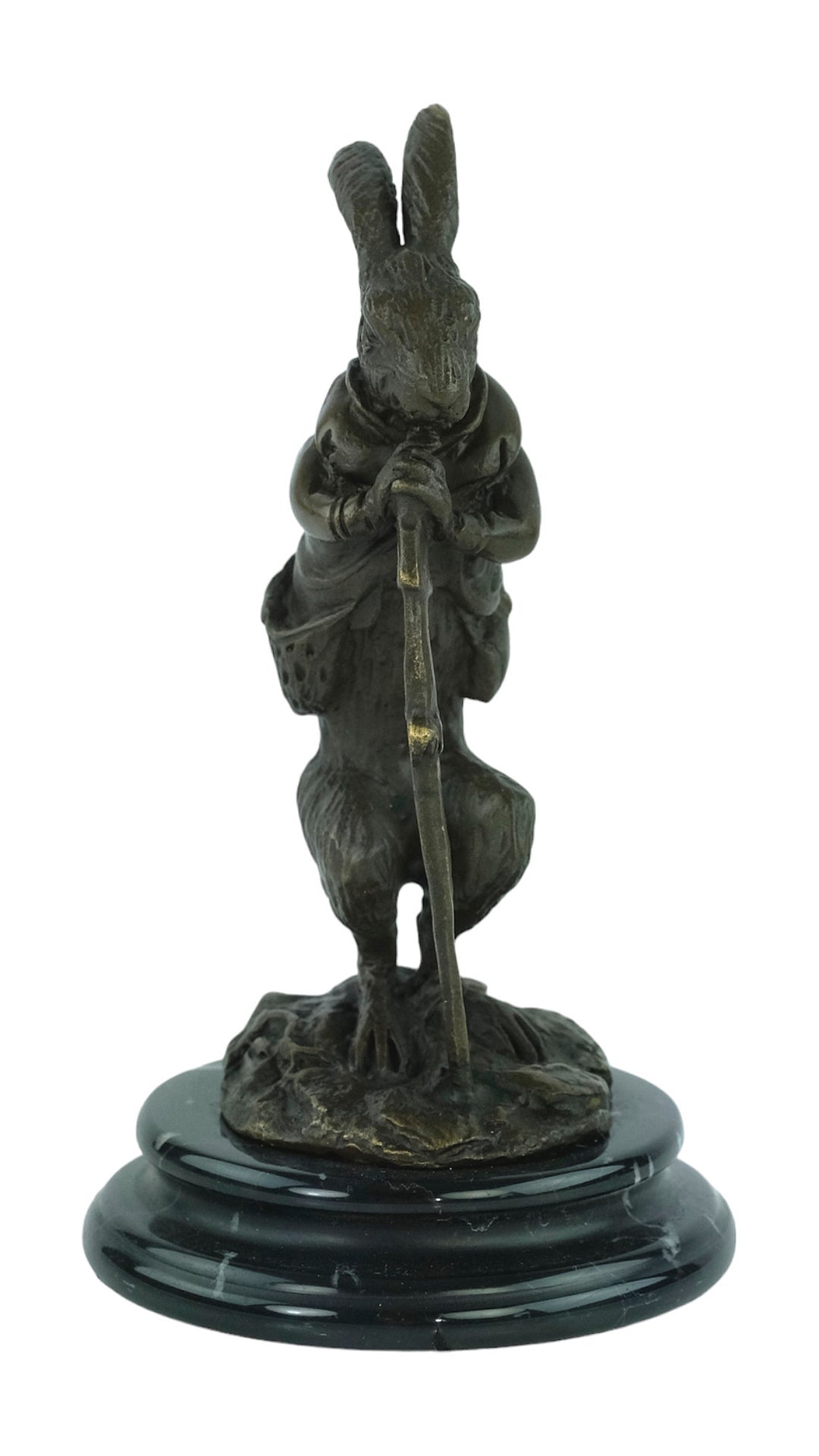 Bronze sculpture of a hare dressed as a hunter
