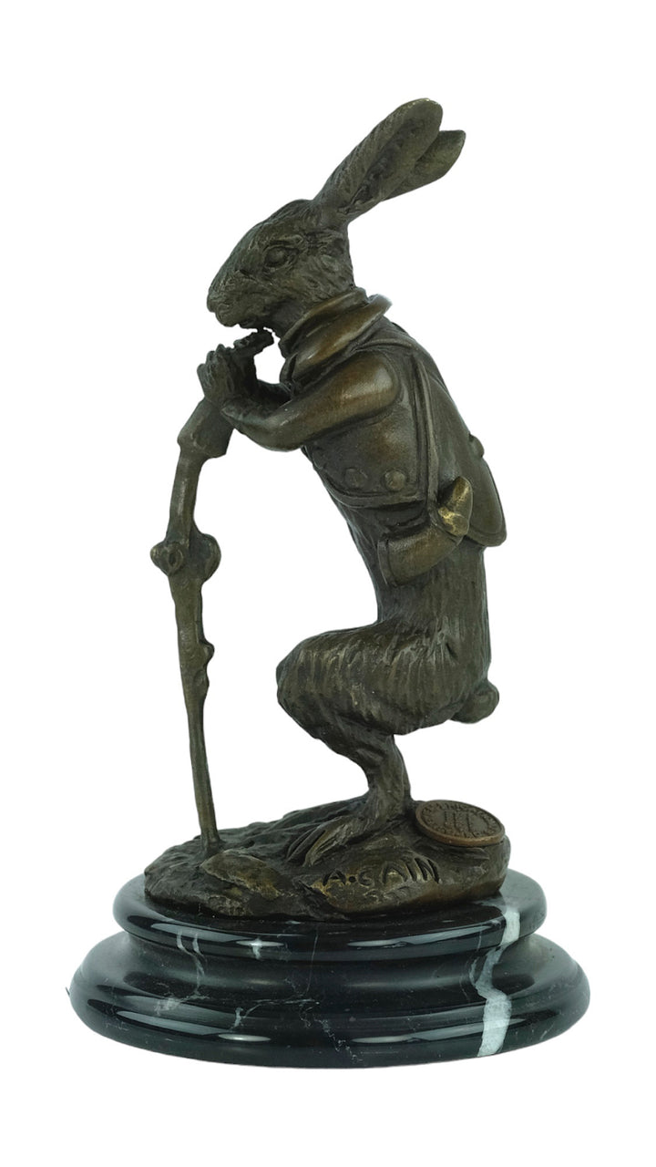 Bronze sculpture of a hare dressed as a hunter