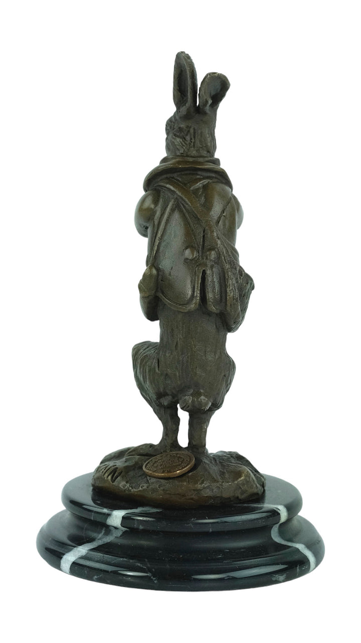 Bronze sculpture of a hare dressed as a hunter