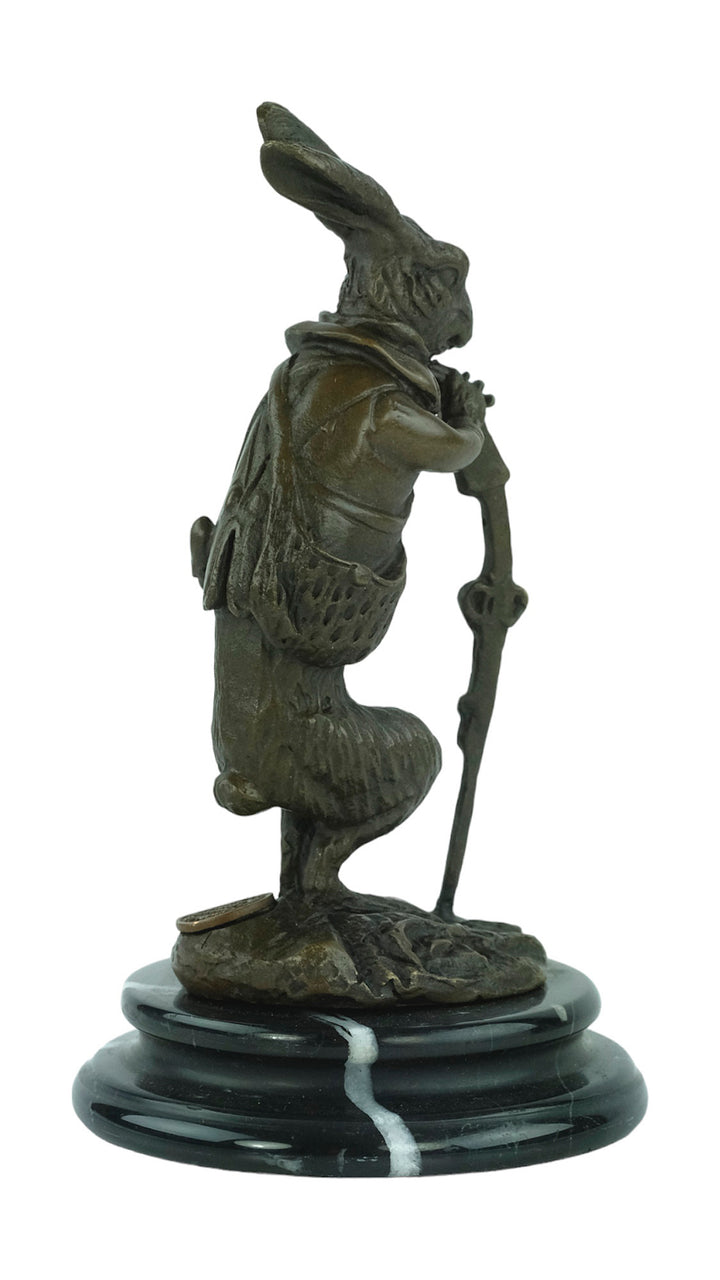 Bronze sculpture of a hare dressed as a hunter