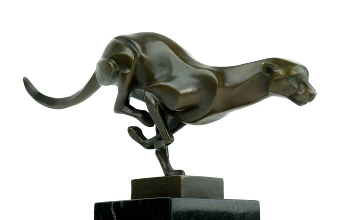 Bronze sculpture of a cheetah running at full speed