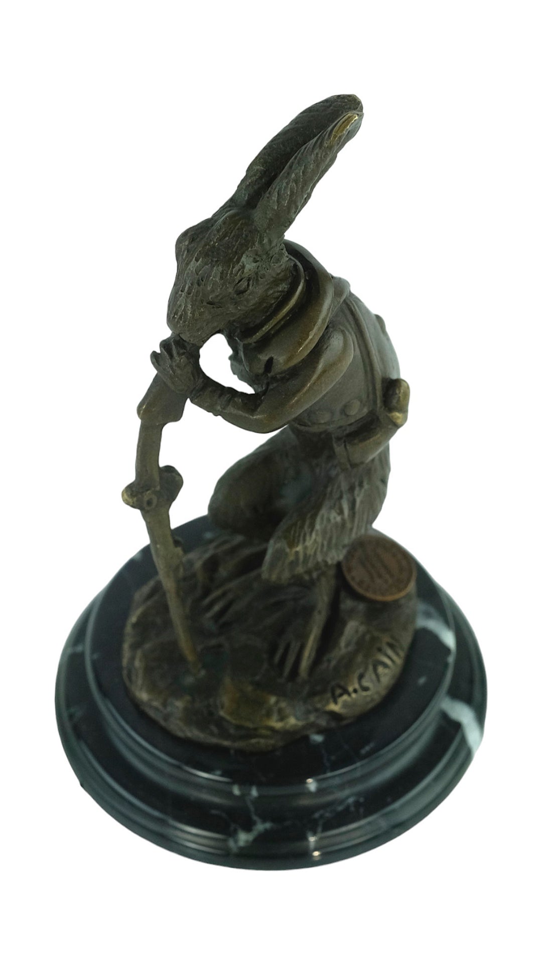 Bronze sculpture of a hare dressed as a hunter