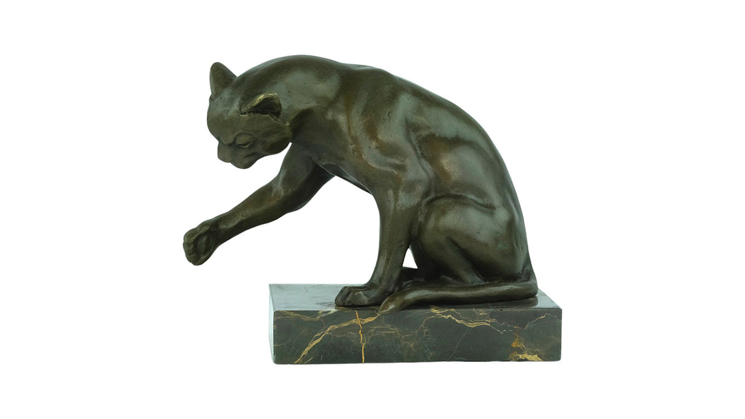 Bronze sculpture of a playing cat