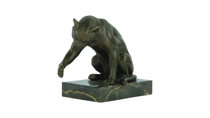 Bronze sculpture of a playing cat