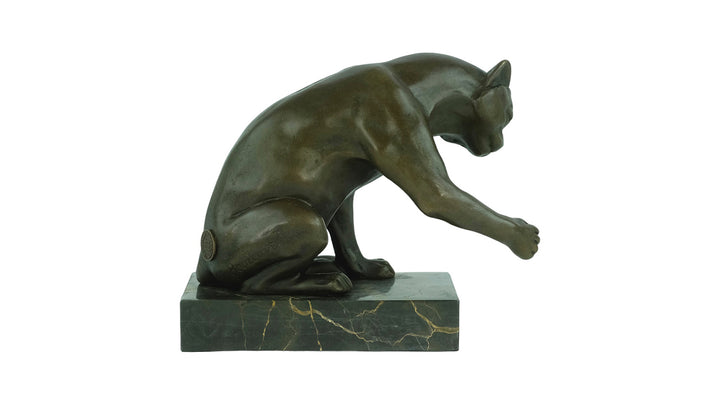 Bronze sculpture of a playing cat