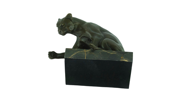 Bronze sculpture of a playing cat
