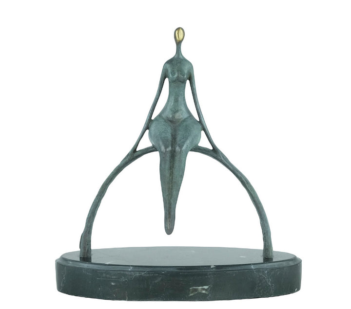 Modern bronze sculpture of a female sitting on a bow