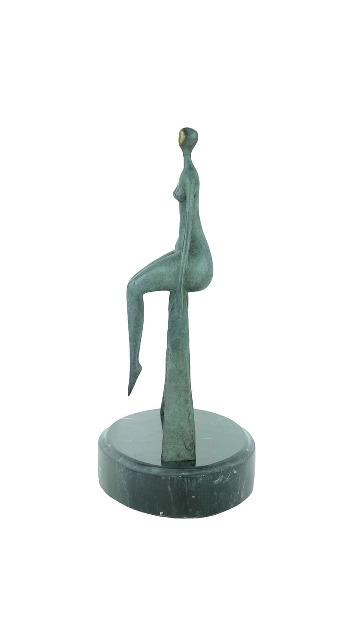 Modern bronze sculpture of a female sitting on a bow