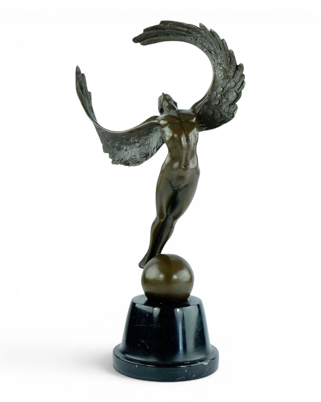 Bronze sculpture of a winged female in rising motion