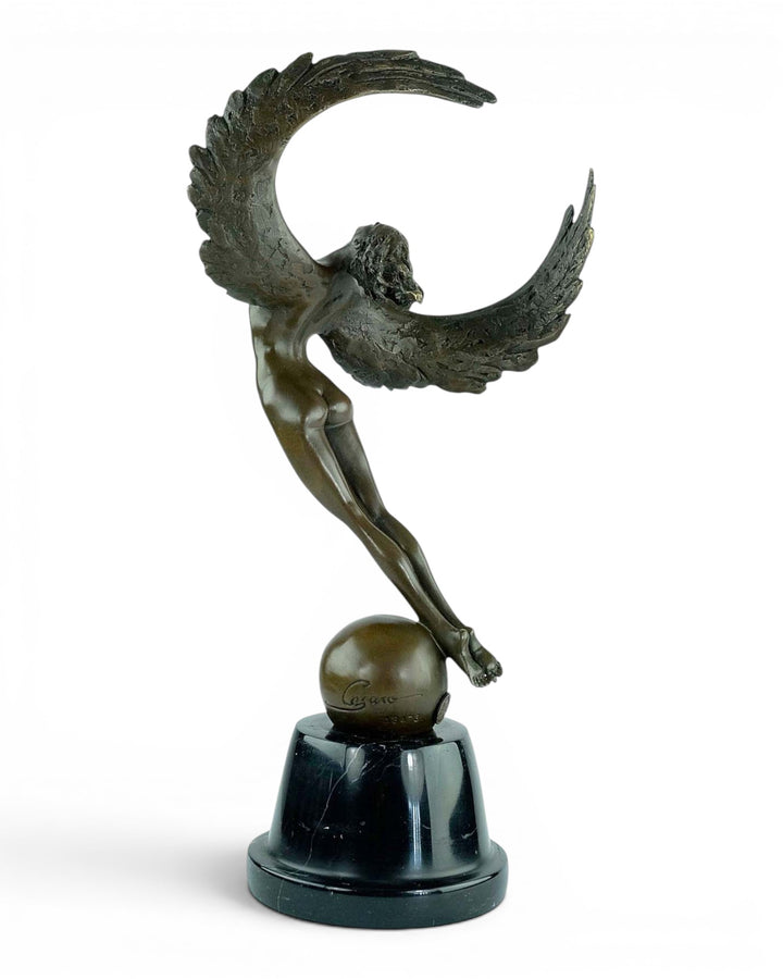 Bronze sculpture of a winged female in rising motion
