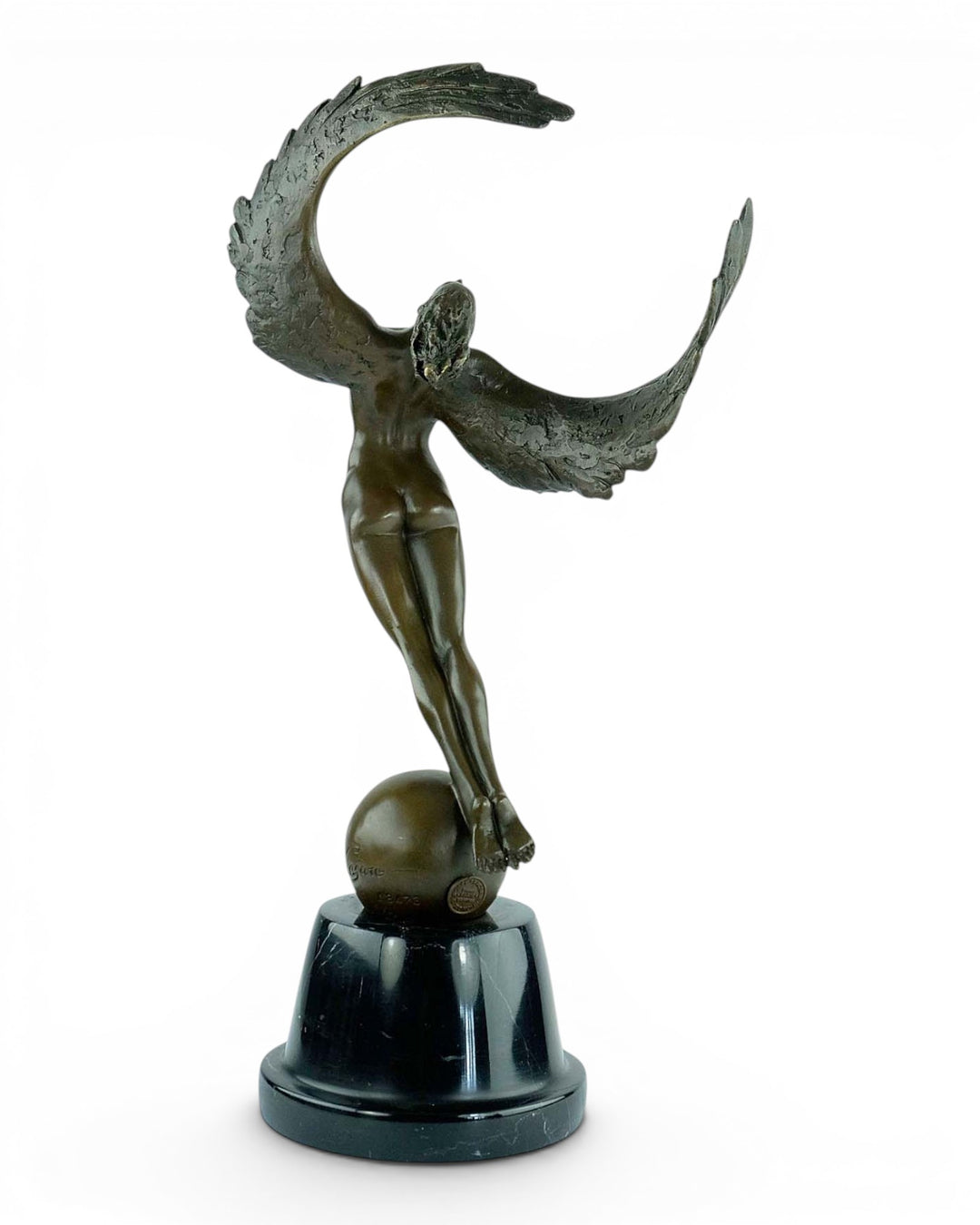 Bronze sculpture of a winged female in rising motion