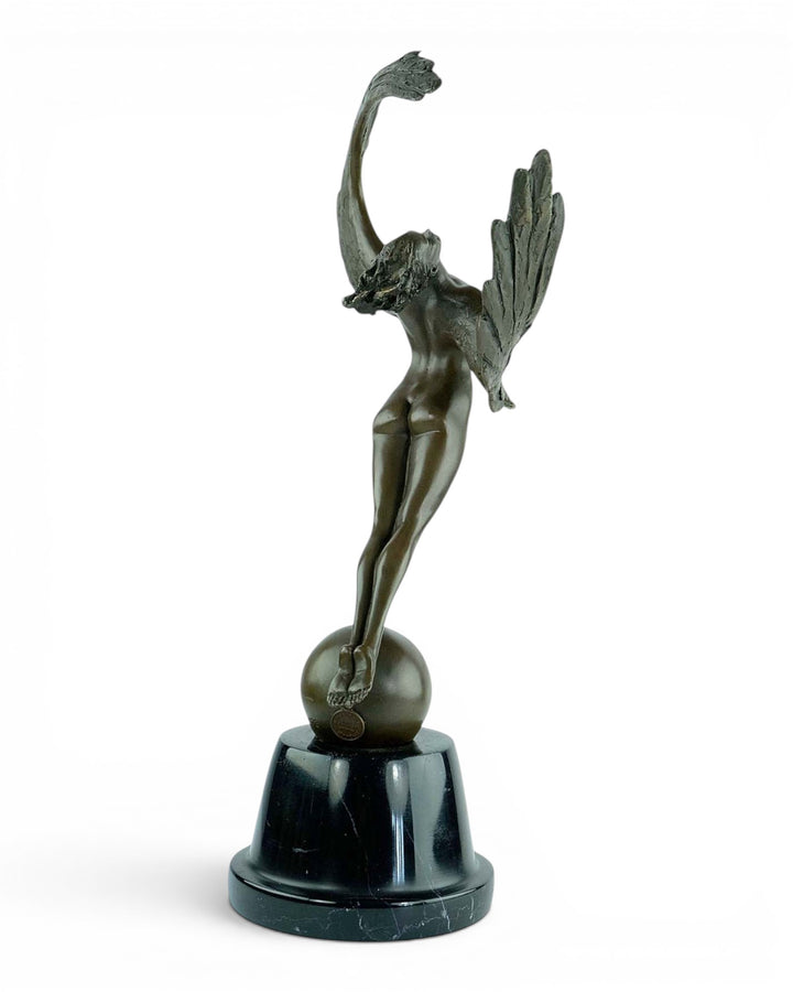 Bronze sculpture of a winged female in rising motion