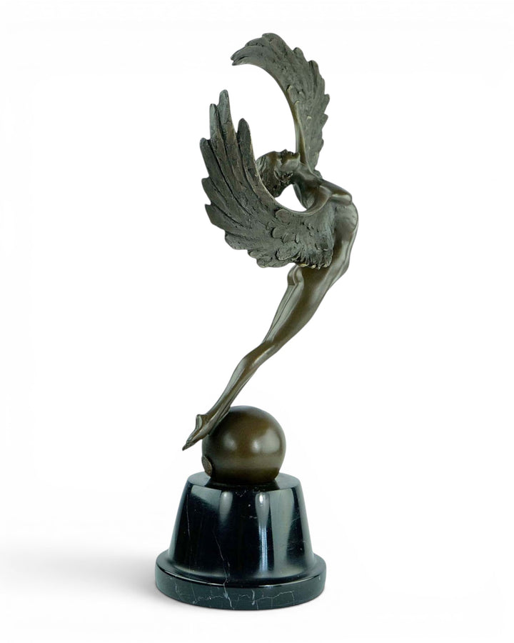 Bronze sculpture of a winged female in rising motion