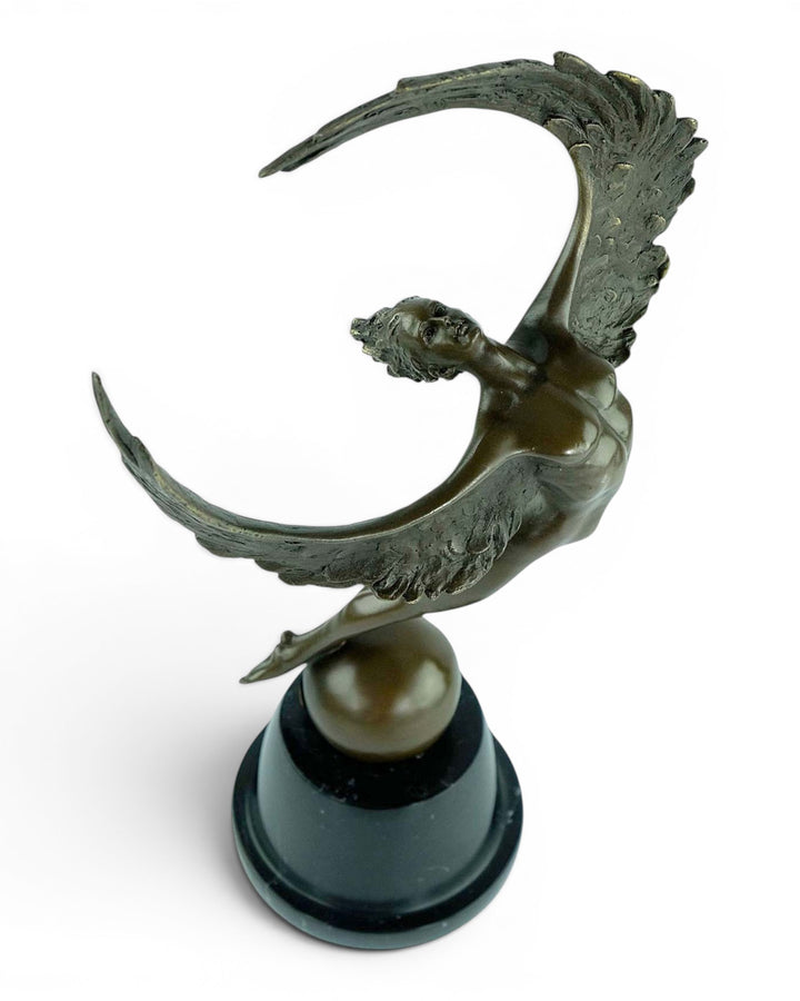 Bronze sculpture of a winged female in rising motion