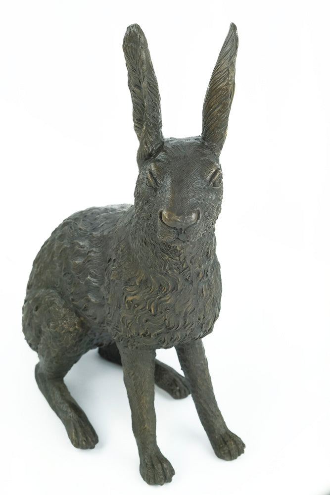 Bronze sculpture of a sitting hare with pricked ears